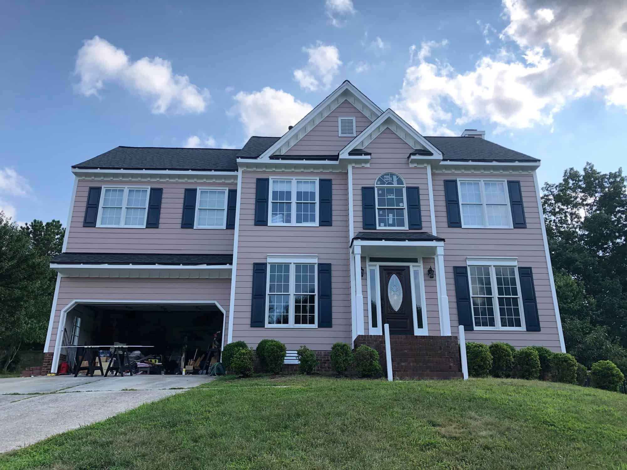 Impeccable attention to detail evident in the exterior painting in Apex, NC- 2 Tone Exterior House Colors